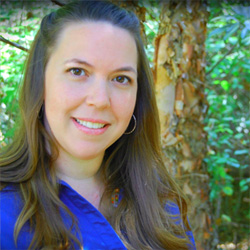 Image of smiling woman with dark hair.