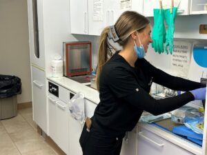 woman working in dentist office